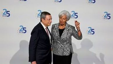 European Central Bank president Christine Lagarde speaks with former ECB president Mario